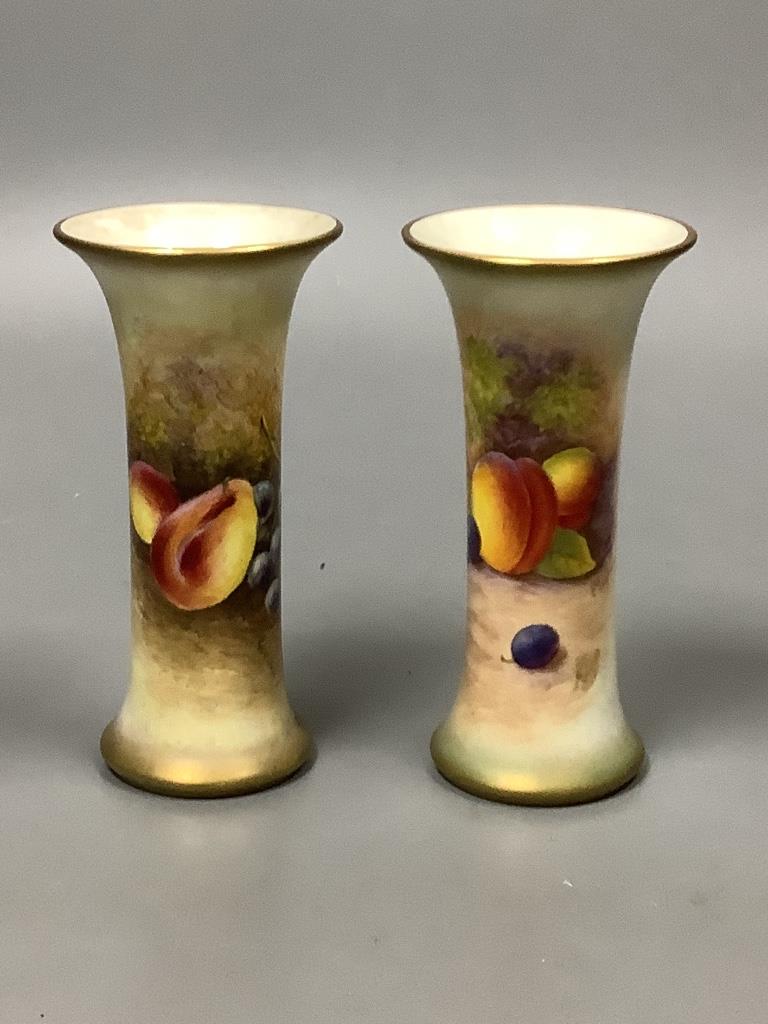 A pair of Royal Worcester fruit painted waisted vases, signed Maybury, height 17cm